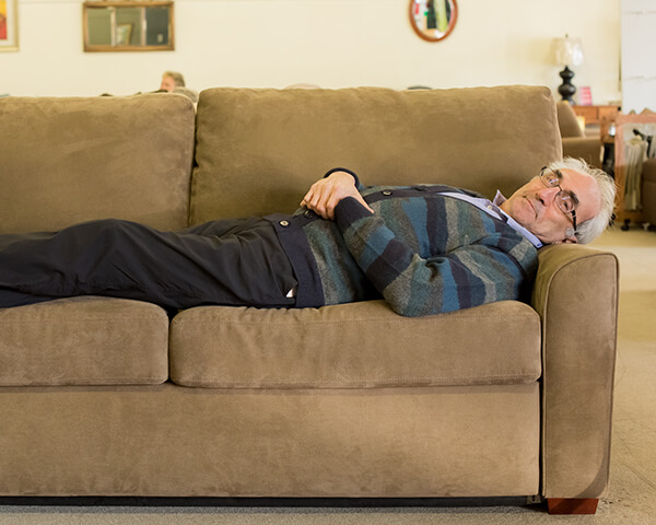 Carlos relaxing on American Leather Comfort Sleeper